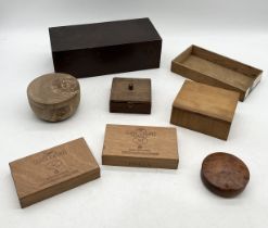 A collection of various wooden boxes including cigar cases etc.