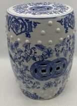 A Chinese blue and white pottery garden seat in the form of a barrel, height 46cm