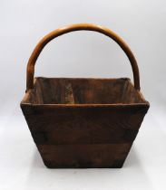 A rustic metal-bound wooden trug