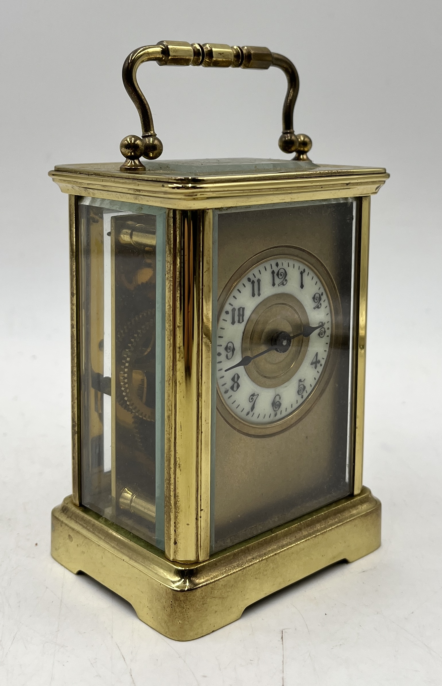 A brass carriage clock with porcelain dial and Arabic numerals - Image 2 of 4