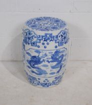 A Chinese blue and white pottery garden stool, in the form of a barrel - height 47cm