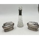 A silver mounted scent bottle along with two silver plated Ronson table lighters