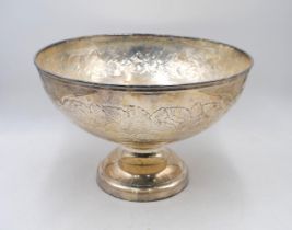 A large silver plated punch bowl, decorated with embossed leaves, marked 'Lancel, Paris' -