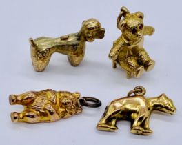 Four 9ct gold charms including a teddy bear on chair, poodle etc. total weight 11.6g