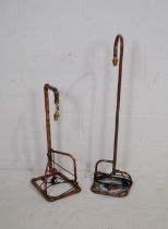 Two lamps formed from copper pipes