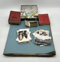 A selection of ephemera including a large vintage scrap book (not all pages photographed),