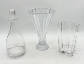 Two large cut glass vases along with a large glass decanter