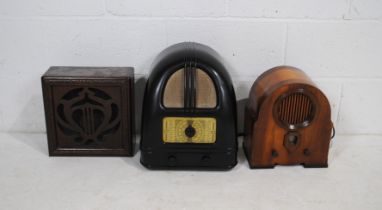 A vintage bakelite radio, along with a vintage mahogany cased radio and an antique oak cased