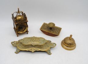 A brass stamp box, along with a brass clerks bell, a blotter and a carriage clock (A/F)