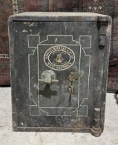 An antique painted metal floor safe with internal drawer by Samuel Withers and co, West Bromwich