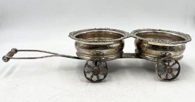 A silver plated double coaster wine trolley