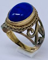 A 9ct gold ring set with lapis lazuli, size Q 1/2