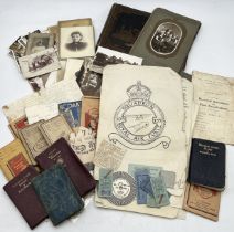 A collection of various ephemera including vintage photographs and album, numerous postcards along