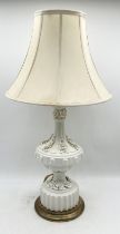 A large Casa Pupo style table lamp with floral detail along with one other