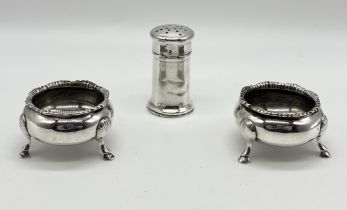 Two hallmarked silver salts (no liners) along with a pillar box shaped pepperette