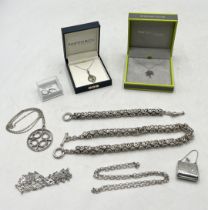 A collection of silver jewellery including a heavy necklace and matching bracelet, miniature