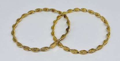 A pair of 9ct gold bangles, total weight 10.6g