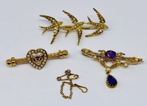 Three 15ct gold brooches set with seed pearls, total weight 12.6g