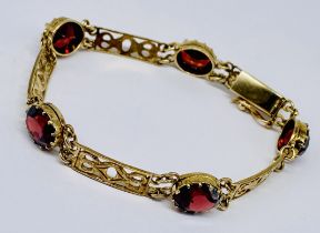 A 9ct gold bracelet, total weight including stones 13.1g