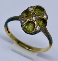 A diamond and peridot cluster ring set in 9ct gold, size M 1/2