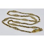 An unmarked 14ct gold (tested) fancy necklace with stylised dolphin clasp set with turquoise and