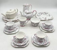 A Grafton China "Ashley" pattern tea set comprising of four trios, teapot, coffee pot, sugar bowl,