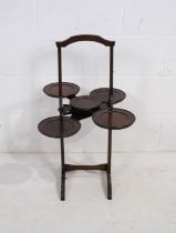 'The Monoplane' early 20th Century mahogany folding five section cake stand - in need of slight