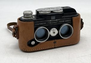 A View-Master personal stereo camera, within original leather case.