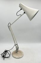 An Anglepoise style table lamp