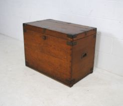 A brass-bound oak trunk, with campaign handles, marked 'Chubb, London' - length 81.5cm, depth