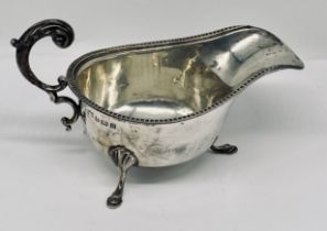 A hallmarked silver sauce/gravy boat, weight 93.2g