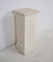 A white painted wooden plinth, with fluted detailing - length 30.5cm, depth 30.5cm, height 69.5cm