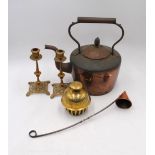 A copper kettle, along with a copper measure, a pair of brass candlesticks and a brass bell