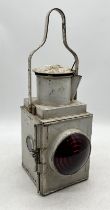 A British Railways western region signal lamp / lantern complete with inner burner and red glass