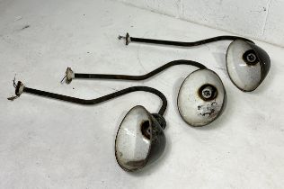 Three vintage exterior light fittings with enamel shades and shaped arm