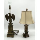 A gilt table lamp in the form of an eagle along with one other