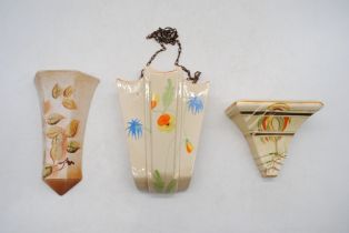 Three Art Deco ceramic wall pockets