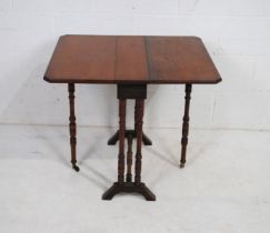 A Victorian mahogany Sutherland table, with bobbin turned supports