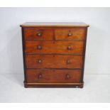 A Victorian mahogany chest of five drawers by Robert Fisher & Co of London, with turned handles,