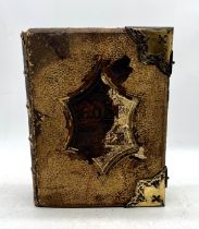 A leather, gilt and brass bound Illustrated Family Bible with vacant family register printed by