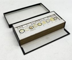 A boxed set of microscope slides mainly named to W.H. Boswell, Torquay. Approximately 47 slides over