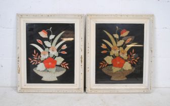 A pair of framed embroideries, each depicting flowers in a basket - 59cm x 49.5cm each