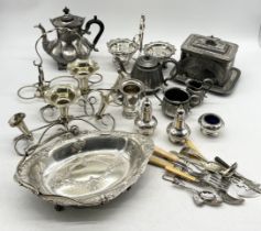 A collection of various silver plated items including candle holders, vases, casket etc.