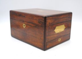 A Victorian rosewood dressing table box, with brass campaign handles and single drawer