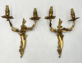 A pair of French Ormolu wall lights with twisted branch design -