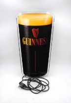 A wall hanging Guinness advertising display light, by 'Prime-lite Illuminations'