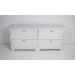 A large modern chest of four drawers - length 170cm, depth 44cm, height 79.5cm