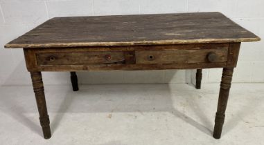 A rustic farmhouse table with three plank top and two drawers 156cm x 83cm