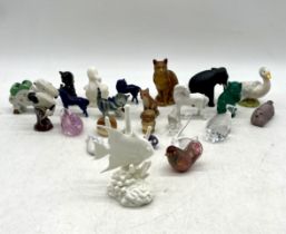 An assortment of glass and porcelain animals including Royal Worcester spade fish (slight chip to