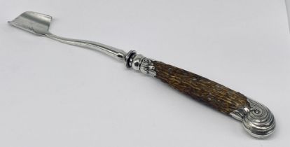 A Victorian stilton scoop with silver mounted antler handle